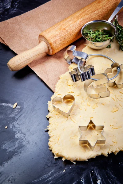 Cheese pastry dough with rolling pin