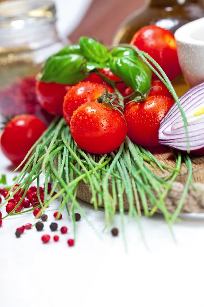 Cherry Tomatoes, chives and peppers — Stock Photo, Image