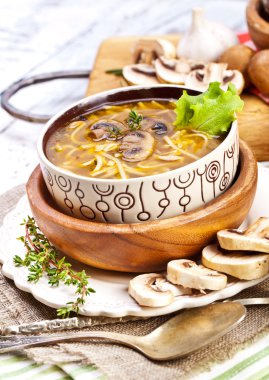 Soup with noodles and mushroom clipart