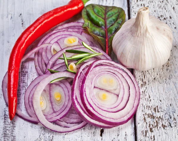 Chili pepper, red onion and garlic — Stock Photo, Image