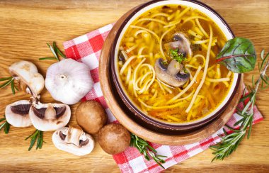 Soup with noodles and mushrooms clipart