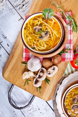 Soup with noodles and mushrooms clipart