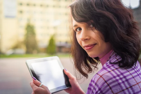 Young woman with Tablet reading — Stock Photo, Image