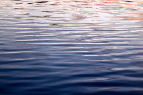 Textur des Wassers bei Sonnenuntergang — Stockfoto