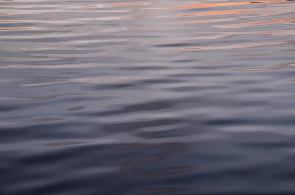 Textur des Wassers bei Sonnenuntergang — Stockfoto