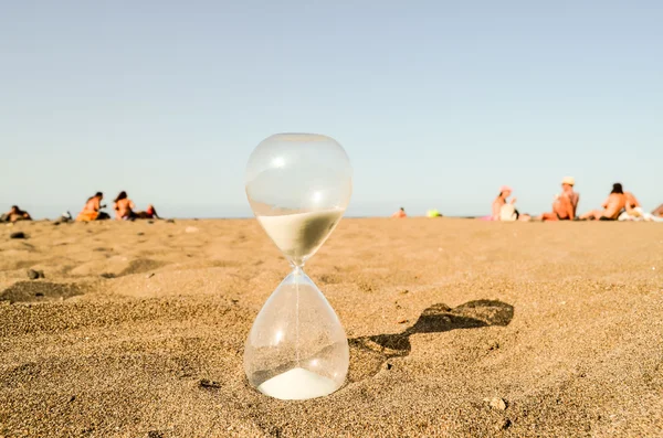 Hourglass Clock on the Sand Beach — Stock Photo, Image