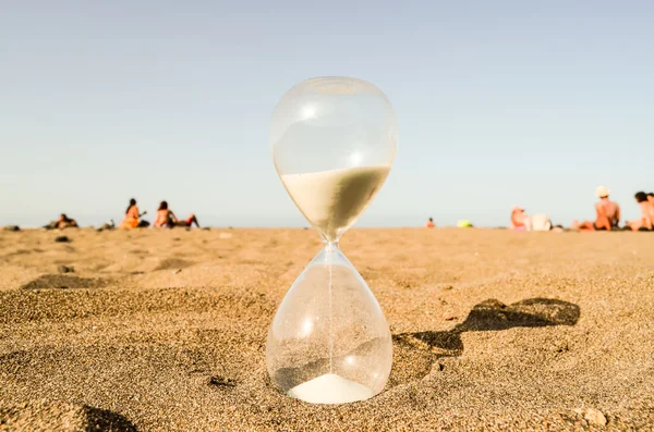 Hourglass Clock on the Sand Beach — Stock Photo, Image
