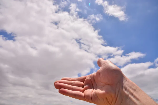 Hand over a Cloudy Sky — Stock Photo, Image