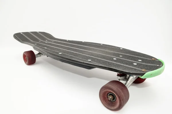 Старый деревянный скейтборд — стоковое фото