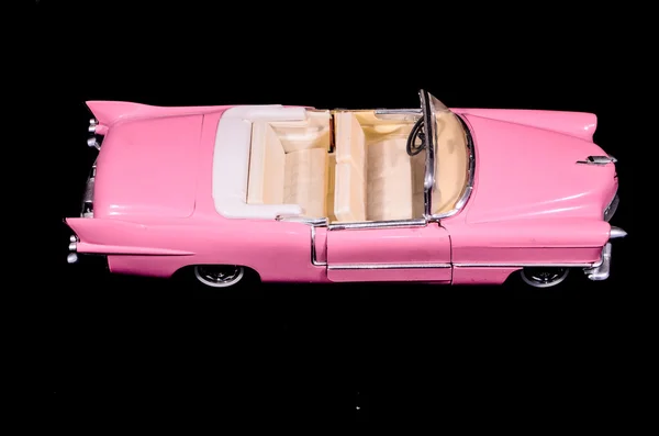 Vaaleanpunainen Caddilac auton lelu malli — kuvapankkivalokuva