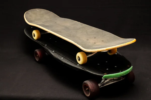 Oude gebruikte houten skateboard — Stockfoto