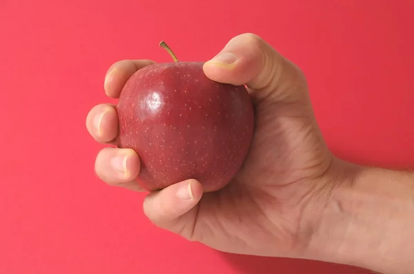 Apple op de hand — Stockfoto