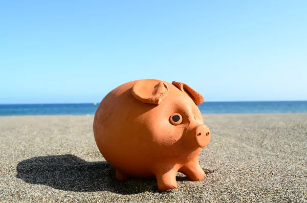 Coin Bank on Sand — Stock Photo, Image
