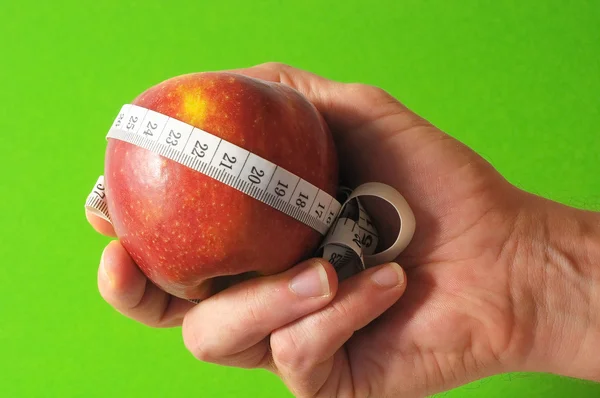 Diet Apple and Meter on the Hand — Stock Photo, Image