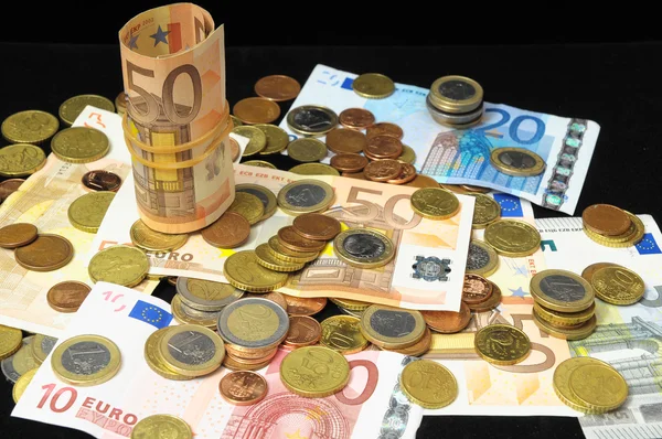 Geld verstreut — Stockfoto