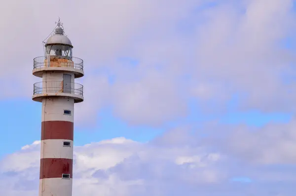 High Lighthouse near the Coast — Stock Photo, Image