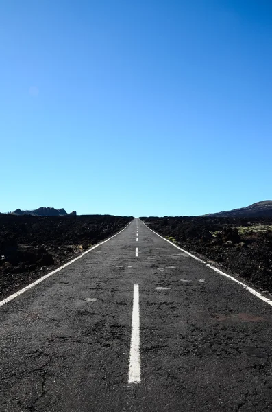 Largo camino solitario — Foto de Stock