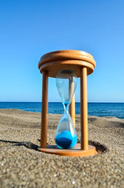 Hourglass Clock on the Sand Beach — Stock Photo, Image