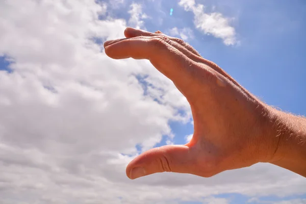 Hand over a Cloudy Sky — Stock Photo, Image