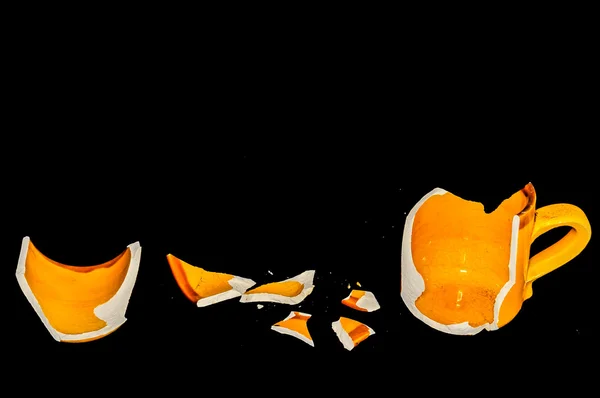 Złamane pomarańczowy kawa filiżanki — Zdjęcie stockowe