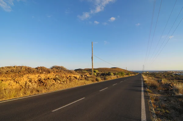 Camino de asfalto en el desierto — Foto de Stock