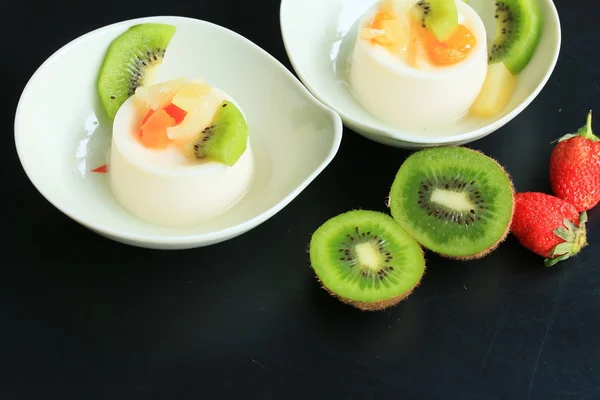 Tasty kiwi fruit pudding Stock Image