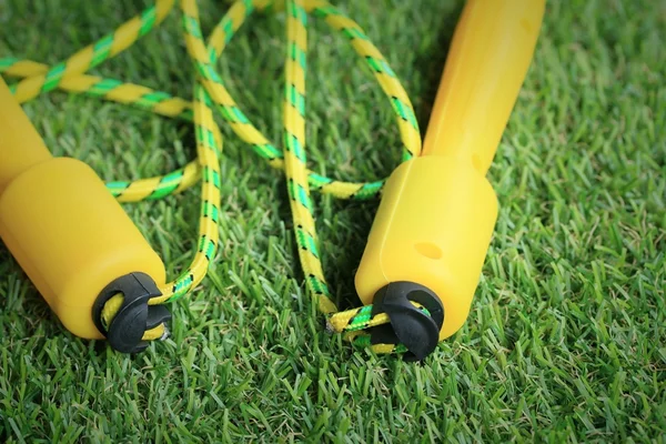 Jump rope on lawn — Stock Photo, Image