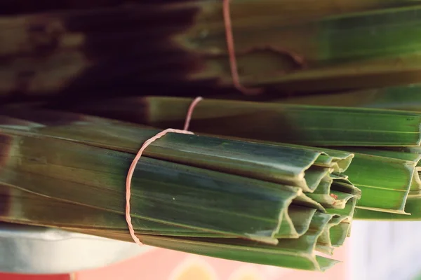 Sticky rice in banana leaves — Stock Photo, Image