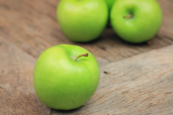 Green apple and red — Stock Photo, Image