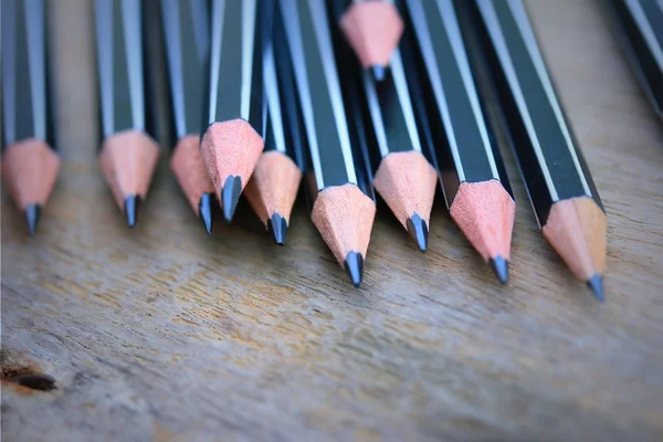 Un sacco di matite nere — Foto Stock