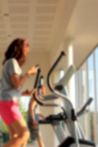 Blurred woman exercising smart phone. — Stock Photo, Image