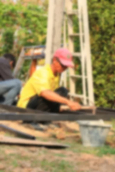 Trabalhadores da construção turva — Fotografia de Stock