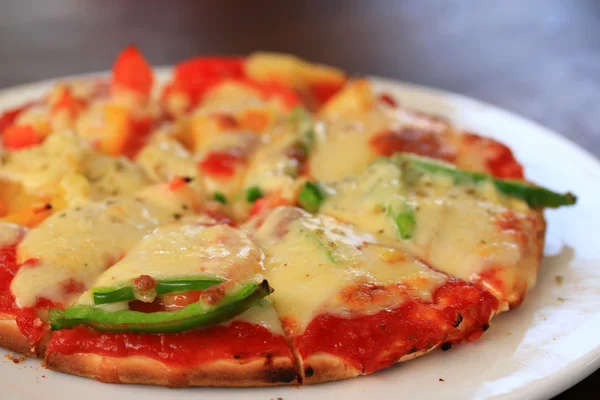 Italian pizza ham cheese and pepper — Stock Photo, Image