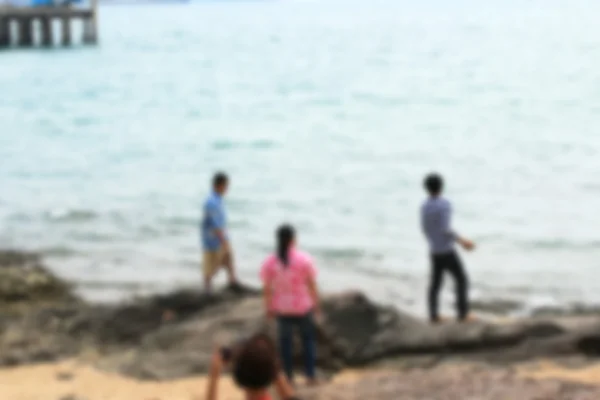 Personas borrosas en la playa —  Fotos de Stock