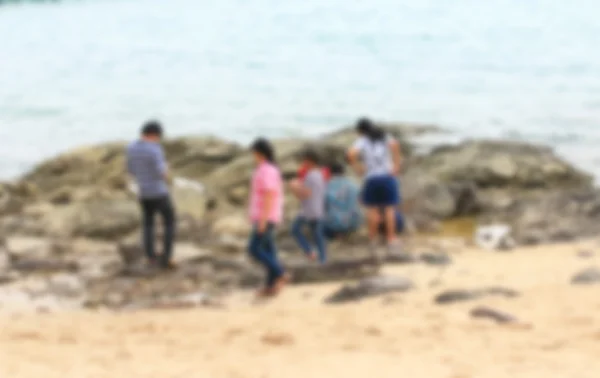 Personas borrosas en la playa —  Fotos de Stock