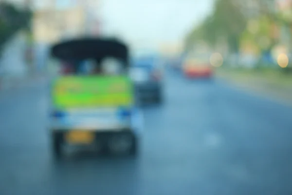 blurred of car in city