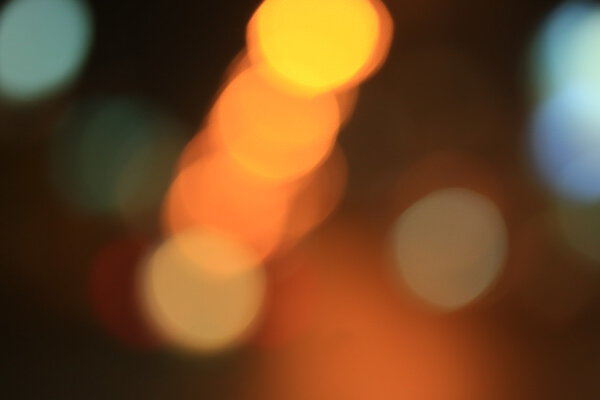 Bokeh blurred of car in city at night