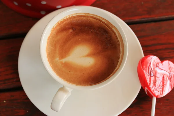 Kaffee trinken und Bonbons süß — Stockfoto