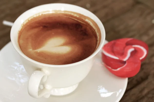 Drinking coffee and candy sweet — Stock Photo, Image