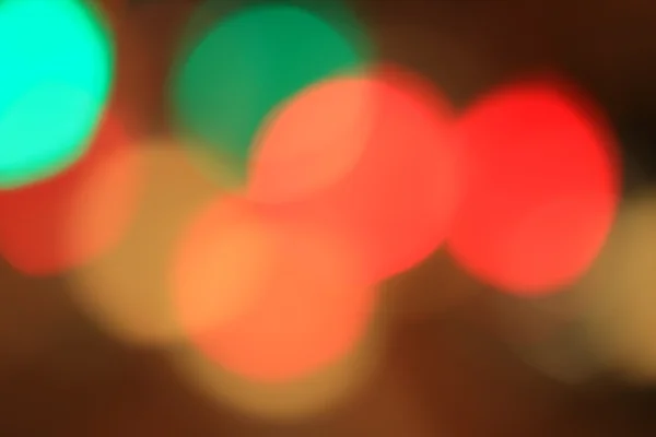 Bokeh desfocado de carro na cidade à noite — Fotografia de Stock