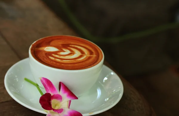 Starodawny sztuka kawa i różowy storczyk — Zdjęcie stockowe