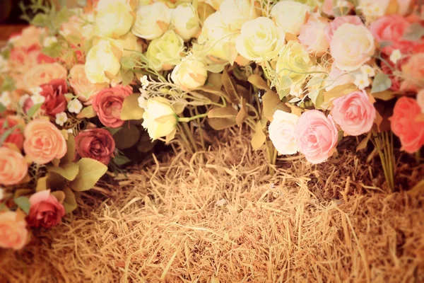 Beautiful vintage roses of artificial flowers — Stock Photo, Image