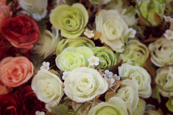 Beautiful vintage roses of artificial flowers — Stock Photo, Image