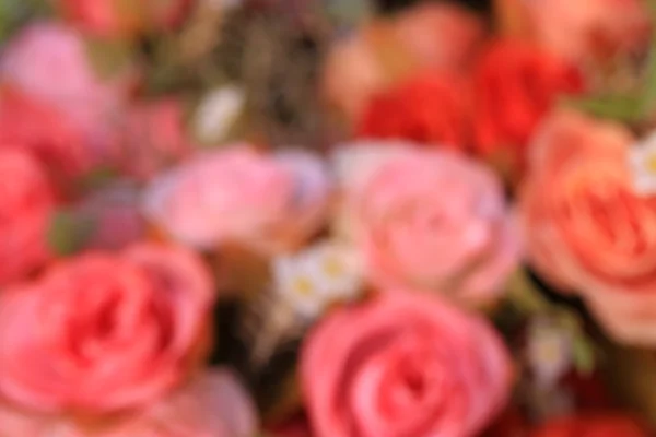 Blurred beautiful vintage roses of artificial flowers — Stock Photo, Image