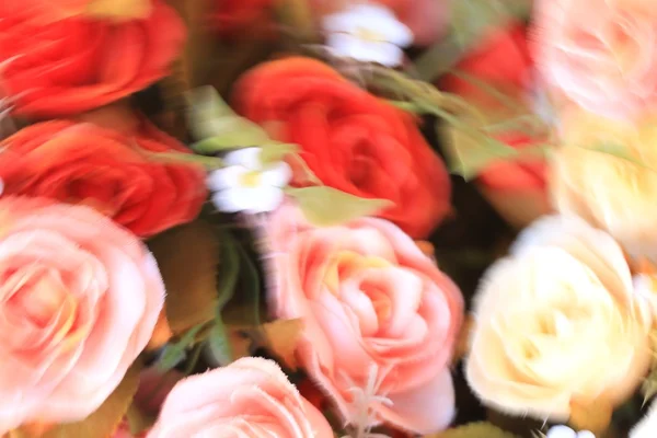 Blurred beautiful vintage roses of artificial flowers — Stock Photo, Image