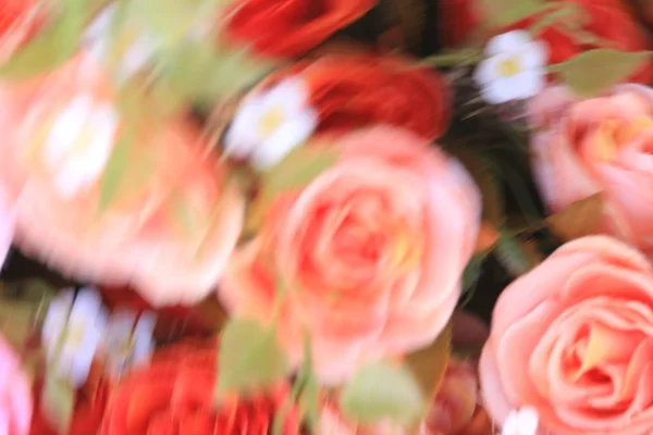 Blurred beautiful vintage roses of artificial flowers — Stock Photo, Image