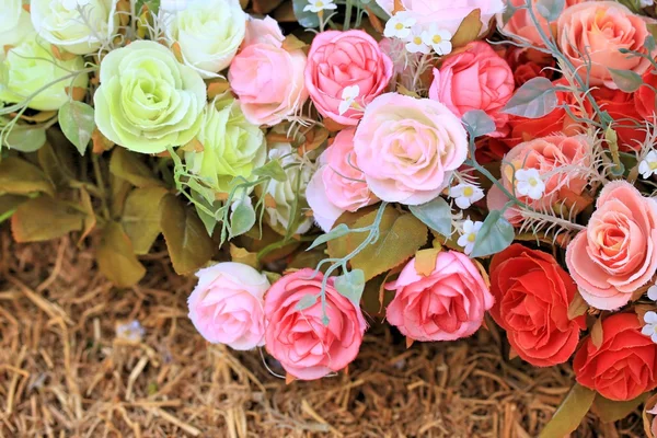 Beautiful vintage roses of artificial flowers — Stock Photo, Image