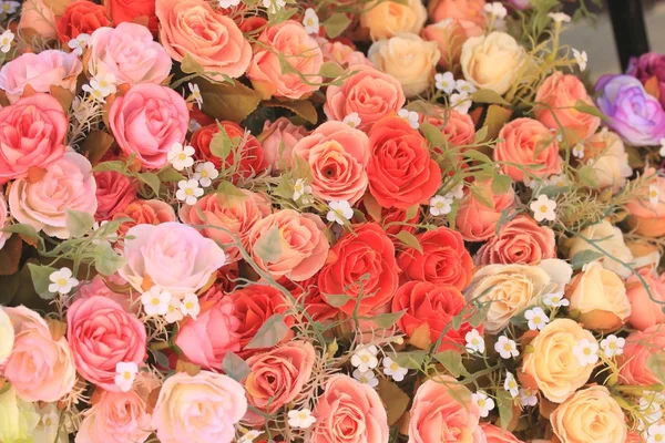 Beautiful vintage roses of artificial flowers — Stock Photo, Image