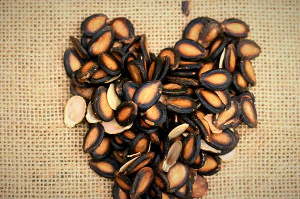 Meloun semena na pozadí — Stock fotografie