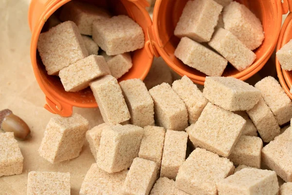 Heap sugar cubes on natural — Stock Photo, Image